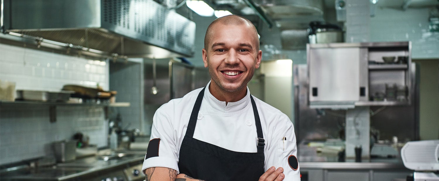 A man working in a kitchen
