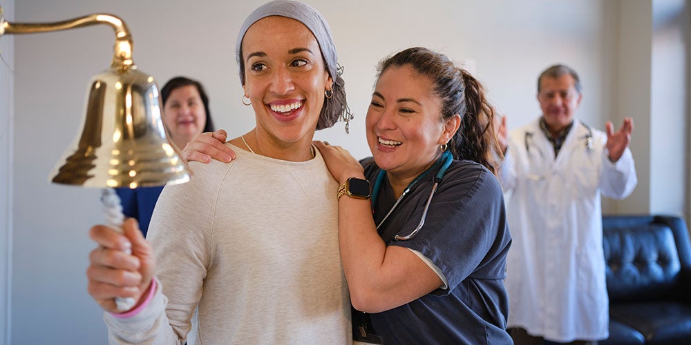 Cancer patient ringing bell