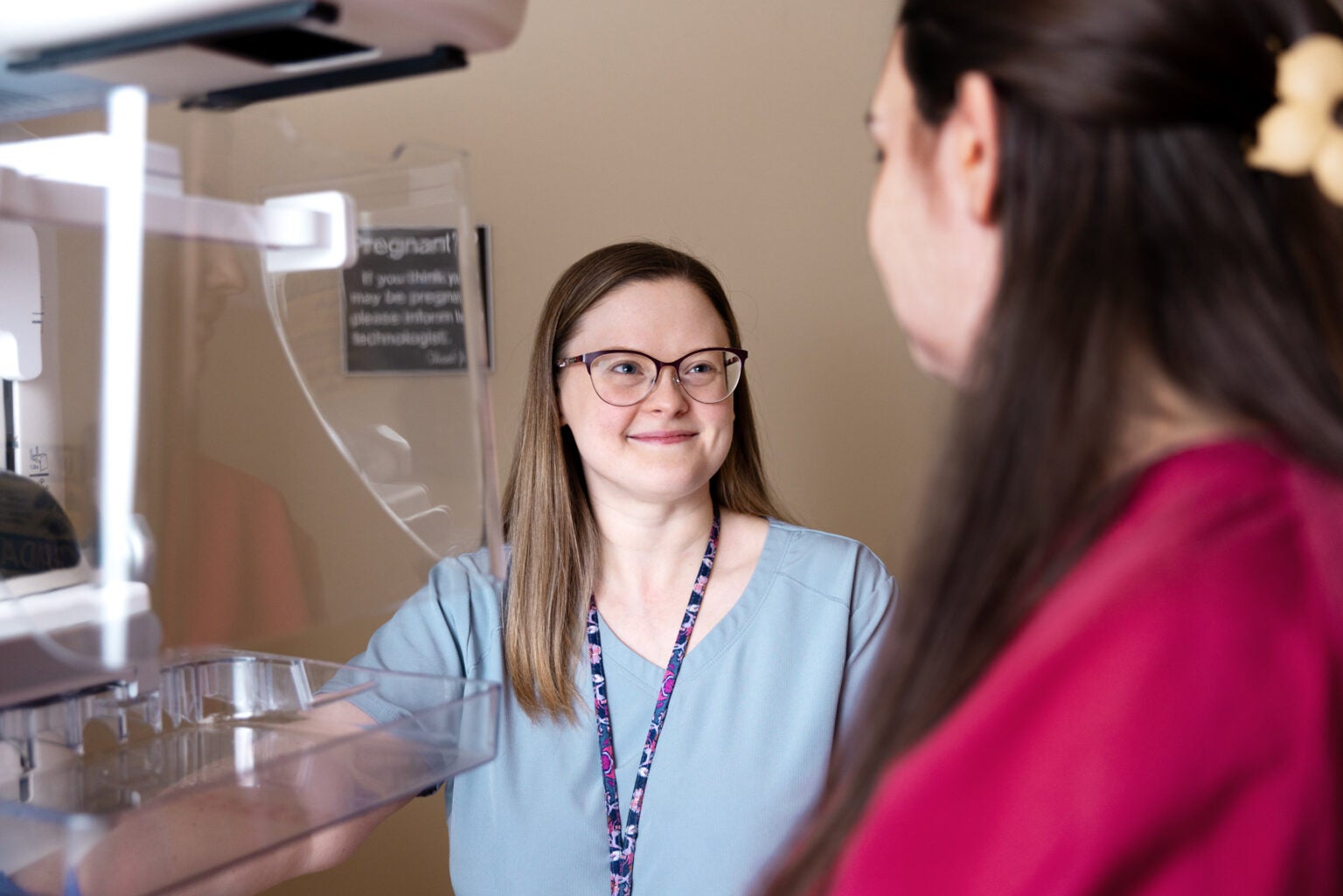 Woman talking to provider.