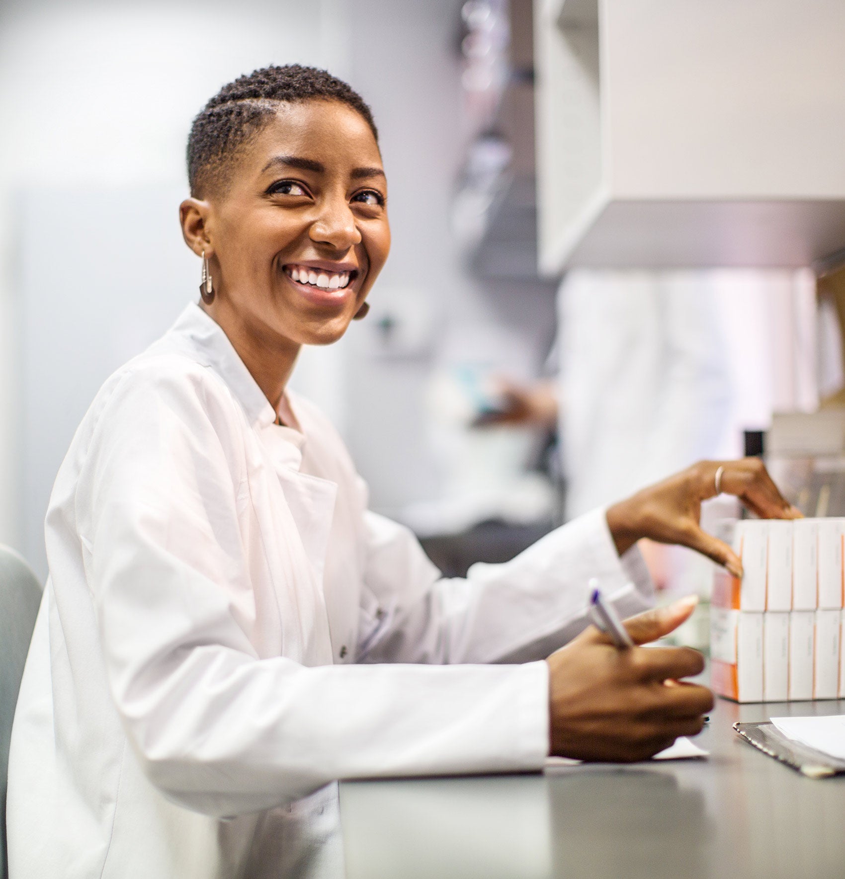 Pharmacist working with medicines.