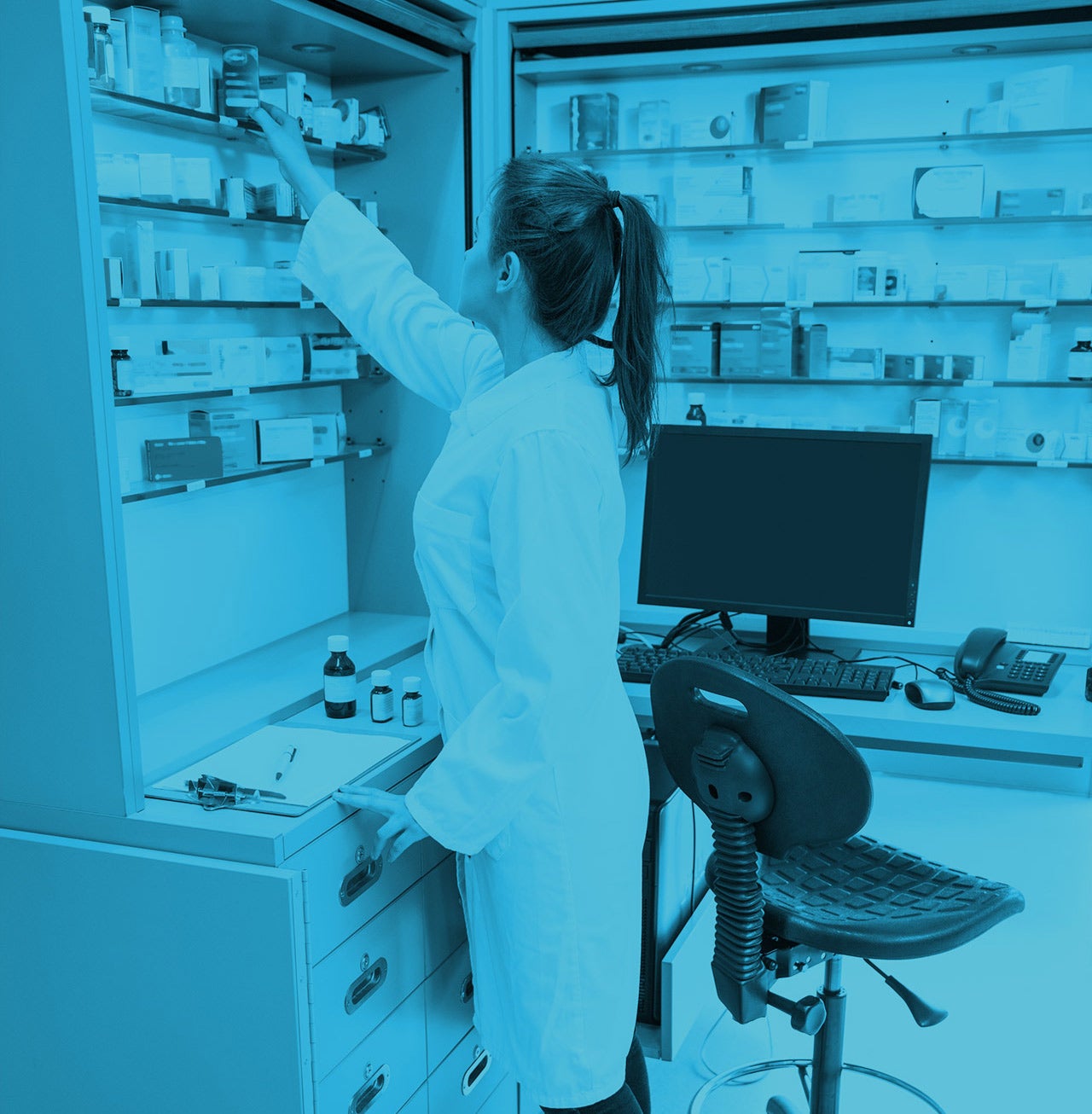 Pharmacist working with medicines.