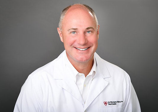 Professional headshot of Christian Carson Hall, MD
