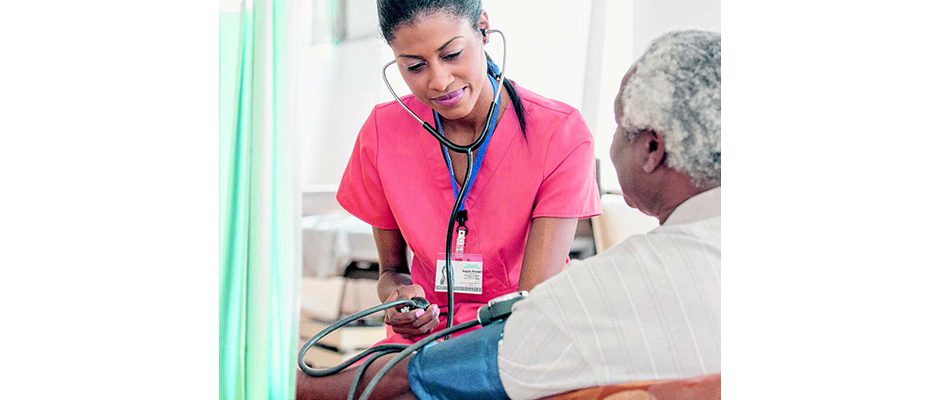 man getting blood pressure checked