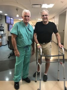 Frederick Fletcher, M.D. stands with Gregg White, the 1,000th outpatient total joint replacement patient at St. Peter’s Hospital