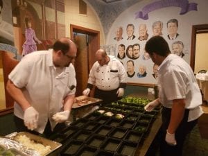 Staff at LoPorto’s Restaurant prepare Easter meals