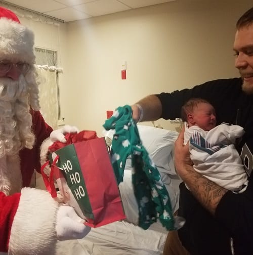 Santa Visits Newborns and Families on Christmas Day at St. Peter’s Hospital