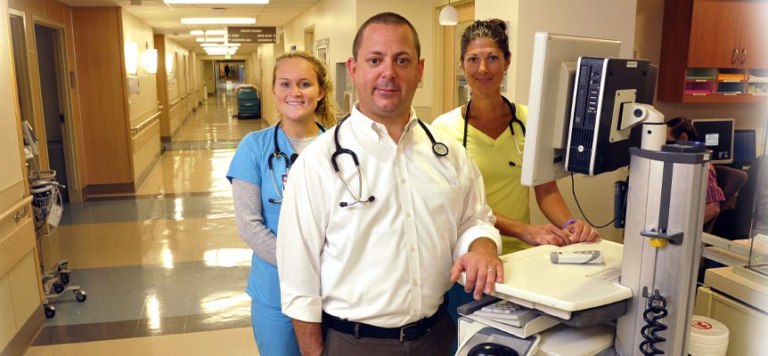 Dr Choma and team DR