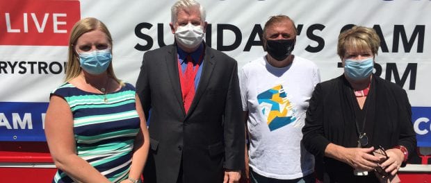 From left: Shannon Galuski, Michael Finegan, Pastor Charlie Muller, Kathy DeRosa