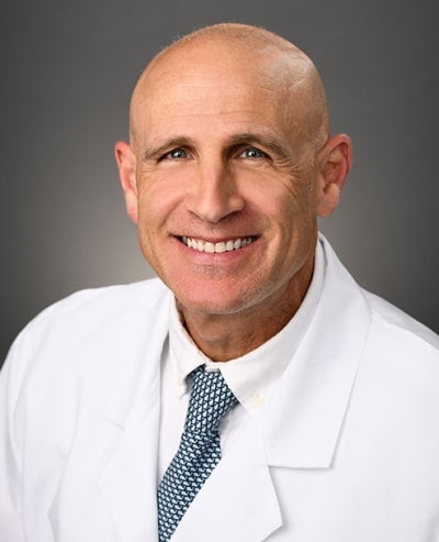 Adam D Snider